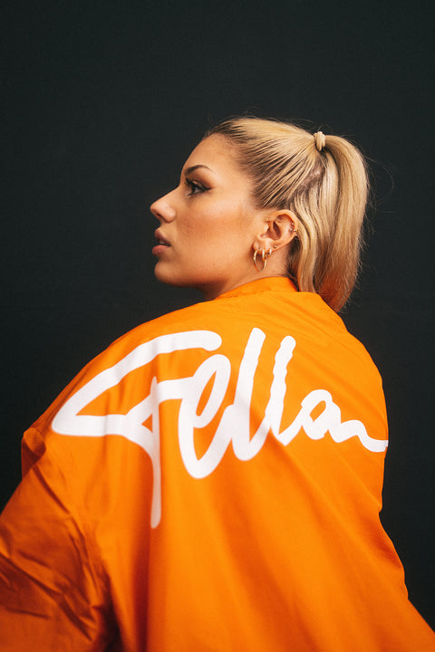 Fella.coacha - hot orange