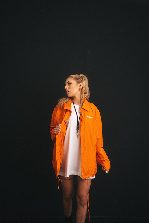 Fella.coacha - hot orange